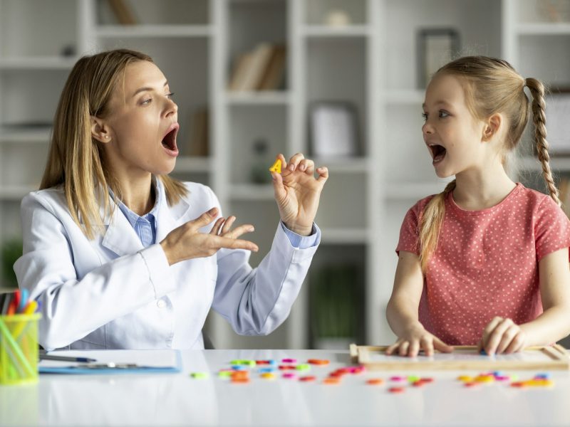 Effective Speech Therapy. Therapist Lady Having Lesson With Cute Little Girl